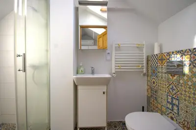 a small bathroom with a sink and a toilet at Atmospheric Apartment close to Old Town by Rently in Kraków