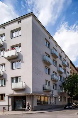 a building with balconies on the side of it at Spacious cental treasure in Kraków