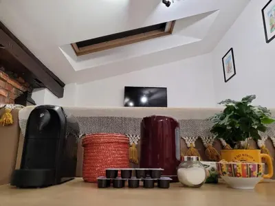 a kitchen counter with vases on a table at Golden Middle Point - best location in Krakow in Kraków