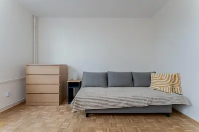 a bedroom with a bed and a dresser at Czepca Quiet Corner Studio by BookingHost in Kraków