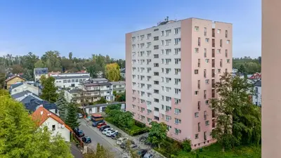 an overhead view of a pink building in a city at Czepca Quiet Corner Studio by BookingHost in Kraków