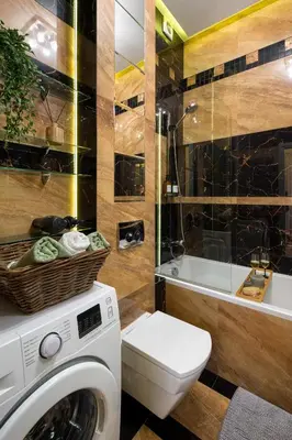 a bathroom with a washing machine and a sink at Discover Krakow Apartments - 8 Rakowicka St - Stylish Balcony Apartment with Netflix in Kraków