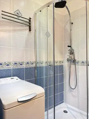 a bathroom with a shower and a sink at Cozy Two Bedrooms Apartment in Cracow City in Kraków
