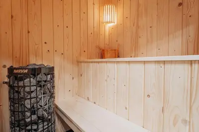 a room with a hammock in a house with a window at Honey House Wierchy- prywatna strefa SPA in Jaszczurowa