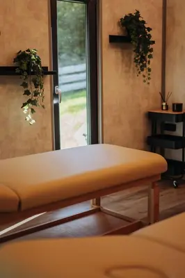 a room with a door with plants on the wall at Honey House Wierchy- prywatna strefa SPA in Jaszczurowa