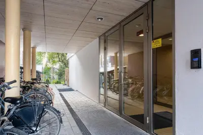 a group of bikes parked outside of a building at Cracow Home Harmony Apartment by BookingHost in Kraków
