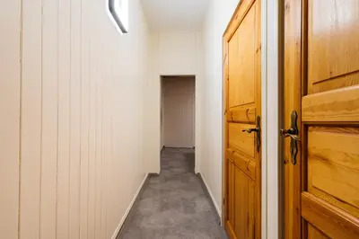 a room with a door and a hallway with a hallway at Native Apartments Krasińskiego 21 in Kraków