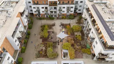 an aerial view of a courtyard between buildings at Dębniki Comfort Studio by BookingHost in Kraków