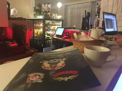 a book sitting on top of a table at Hotel Mis in Bochnia