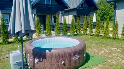 a pool in the yard of a house at Sister's House Zator in Palczowice