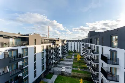 an aerial view of a courtyard in an apartment building at Imperial Capital Apartments by BookingHost in Kraków