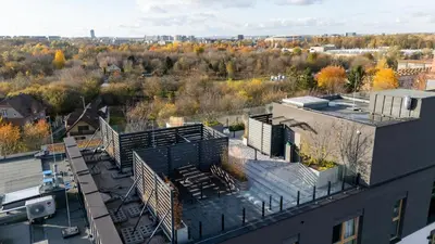 an aerial view of a building in a city at Imperial Capital Apartments by BookingHost in Kraków