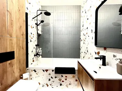 a bathroom with a toilet and a sink and a shower at Old Town Krakow Loft - Design Apartaments in Kraków