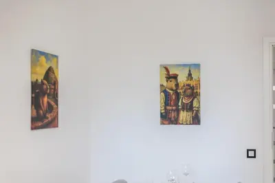 a hallway with a wooden door and a staircase at 3 Rooms Comfort Capybara Apartment Free Parking by CityBeat in Kraków