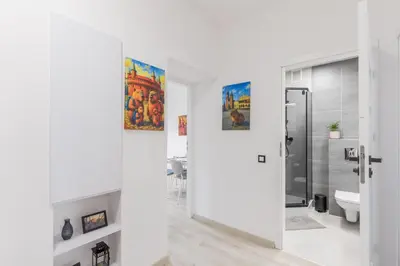 a bathroom with a toilet and a sink at 3 Rooms Comfort Capybara Apartment Free Parking by CityBeat in Kraków