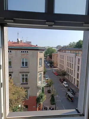 a view of a city street from a window at Appartement au coeur de Kazimierz in Kraków