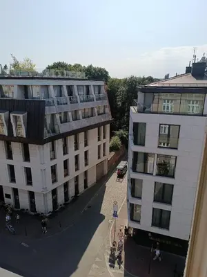 an overhead view of a building next to another building at Appartement au coeur de Kazimierz in Kraków