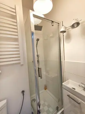 a bathroom with a shower and a sink at Daniel Apart Hotel Krakow in Kraków