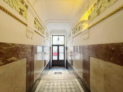 an empty hallway with a door in a building at Pstrak zyblikiewicza in Kraków