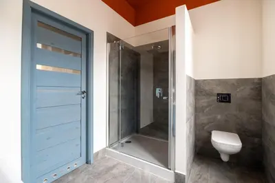 a bathroom with a sink and a mirror at Candy Colored House - Old Town in Kraków