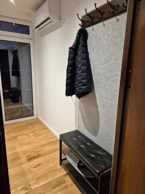 a room with a closet with a bench in it at The Hidden Echo Studio Kazimierz, #Netflix # AC# in Kraków