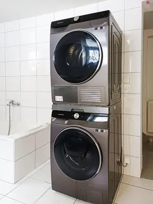 a washing machine and a dryer in a bathroom at Zwierzogród in Rabka