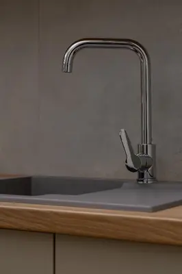 a sink with a faucet in a kitchen at Studio for 2 - Augustiańska 1 - Kazimierz in Kraków