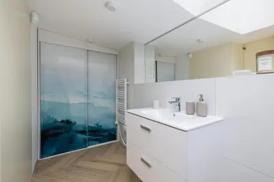 a bathroom with a sink and a shower at Apartment with AC- Augustiańska 1 in Kraków