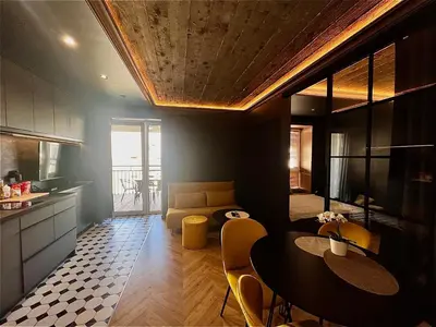 a kitchen and dining room with a table and chairs at Urban Chic Panorama - Design Apartaments in Kraków