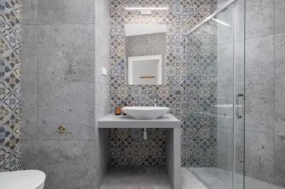 a bathroom with a sink and a shower at 2 Bedroom Apartment for 6 - Augustiańska 1 street in Kraków