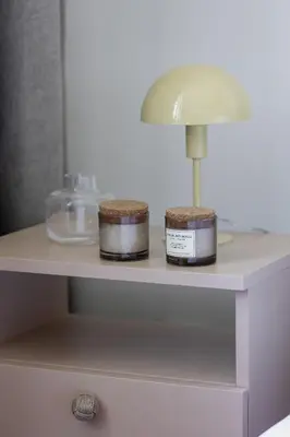 a table with a lamp on top of a shelf at Studio with AC - Augustiańska 1 in Kraków