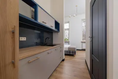 a kitchen with a sink and a counter top at Jewish Quarter- Augustiańska 1- AC in Kraków