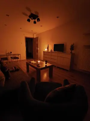 a living room with a couch and a coffee table at A cozy corner of Płaszów in Kraków