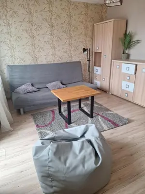 a hallway of a house with a glass door at Sky View Cracow Apartment in Kraków