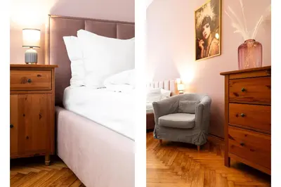 a bedroom with a bed and a chair at Househost Apartment Zacisze 16 in Kraków