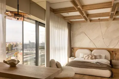 a bedroom with a bed and a large window at SOFTly Landmark View City Center FREE PARKING in Kraków
