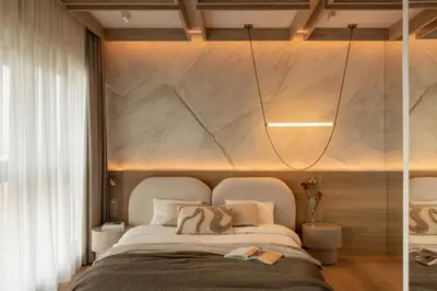 a bedroom with a bed with a large headboard at SOFTly Landmark View City Center FREE PARKING in Kraków