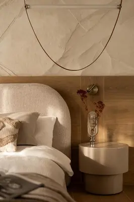 a bedroom with a bed and a table with flowers on it at SOFTly Landmark View City Center FREE PARKING in Kraków