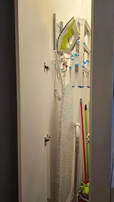 a bathroom with a sink and a mirror and tooth brushes at NextToNobu in Kraków