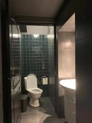 a bedroom with two beds with white towels on them at Lanzo ST 48 in Kraków