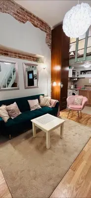 a living room with a couch and a coffee table at Old town Krakow in Kraków