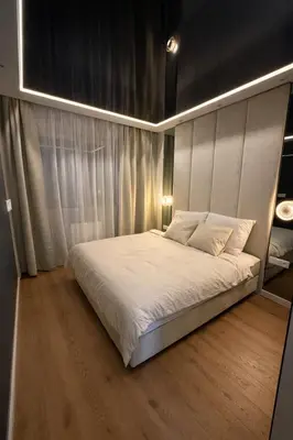 a bedroom with a large white bed in it at Anielski Apartament z jacuzzi i sauną NOWY 2 sypialnie Relaks & SPA in Kraków