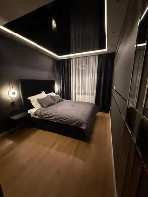 a small bedroom with a bed and a window at Anielski Apartament z jacuzzi i sauną NOWY 2 sypialnie Relaks & SPA in Kraków