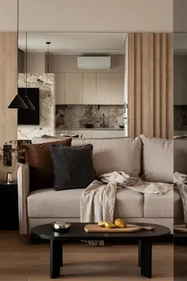 a living room with a couch and a table at Panoramic Landmark View City Center FREE Parking in Kraków