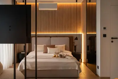 a bedroom with a large bed with lights on it at Sunset Balcony City Center Free Parking in Kraków