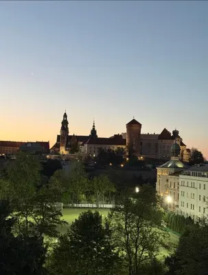 a view of a city skyline at dusk at The perfect cozy Oasis in Kraków