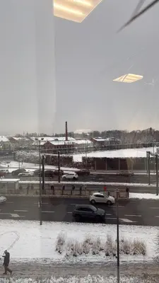 a view of a street with cars on a road with snow at The perfect cozy Oasis in Kraków
