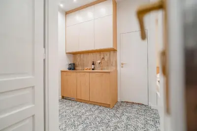 a bathroom with a toilet and a sink and a shower at Design Apartment Kazimierz, Old Town Area in Kraków