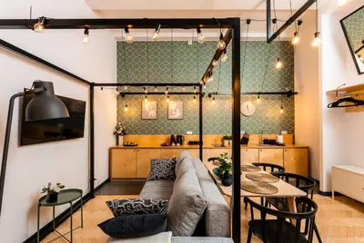 a kitchen with a long counter with bread on it at Old Town Loft Designed with Love in Kraków