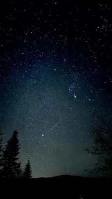 a starry night with a plane streak in the sky at Blejkówka in Stryszawa